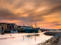 Fishing boats at sunset